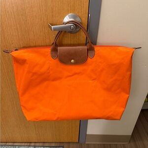 Longchamp Orange Nylon Le Pliage Tote with Brown Leather Trim